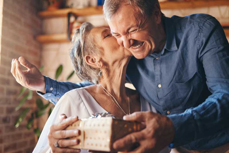 anniversary party restaurant in quincy ma - happy senior couple celebrating