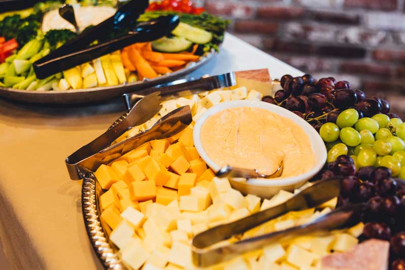 funeral luncheon venue - this is a photo of cheese and cracker plates at an event