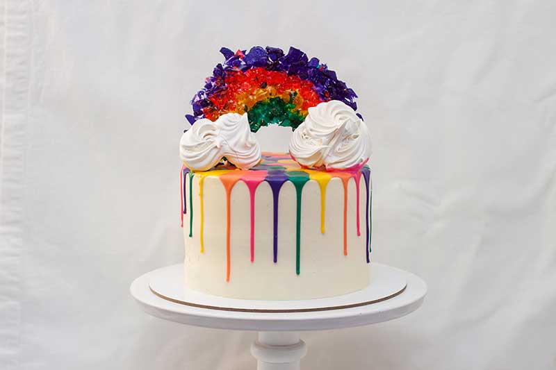 same sex wedding venue on the south shore ma - rainbow-decorated wedding cake