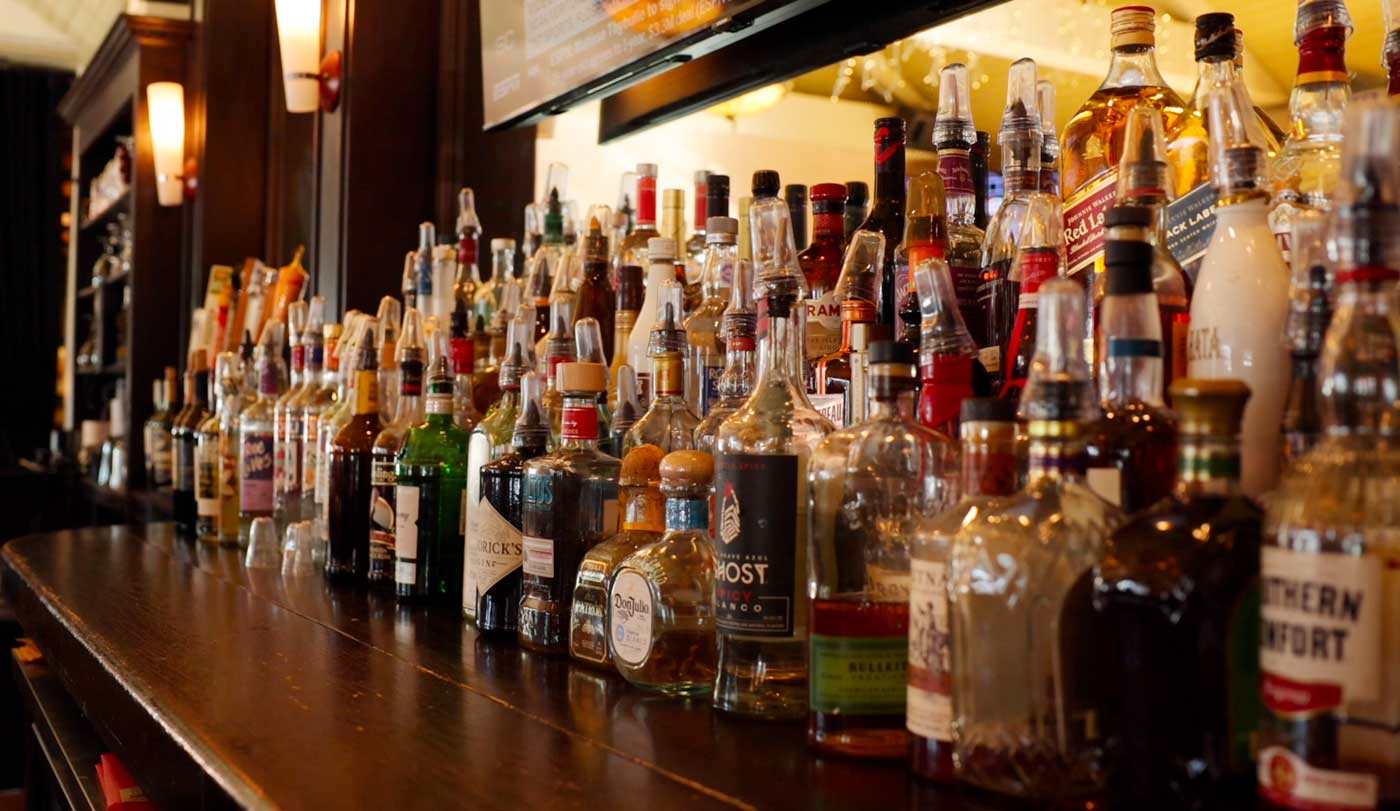 bottles of liquor behind the bar