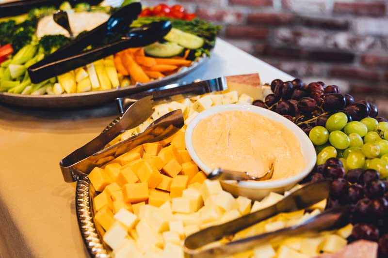 corporate lunch catering - cheese and cracker and vegetable platters